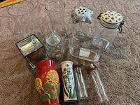 Group shot of all glass and ceramic pieces on carpet