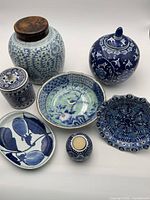 all seven porcelain pieces displayed