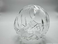 Oblique view of spherical crystal bowl highlighting diamond and vertical cuts