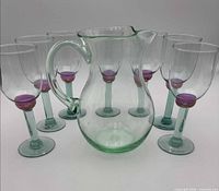 full set showing pitcher and six matching glasses