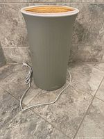 Full view of towel warmer with power cord
