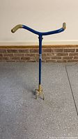 Blue stand-up cultivator/weeder showing full length and tines