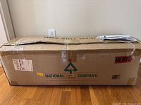 Branded National Tree Company cardboard box with tape wear