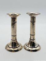 Full view of both sterling silver candlesticks