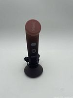 Full view of Perfectio X device on charging base