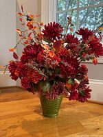 Full view of silk floral arrangement in green ceramic vase