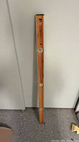 Front view showing wood body and vials