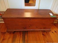 front view of wooden blanket chest