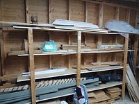 Shelved assortment of boards, trim and plywood pieces