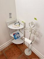Corner shelf, toilet paper holder, sign, fresheners