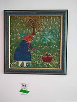 Full view of framed painting on wall