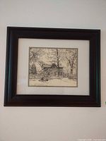 Framed print on wall showing full artwork and frame