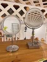 Both vanity mirrors side by side on tabletop