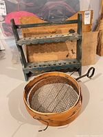 Wall shelf, sifter and panels grouped