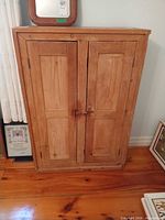Front view of solid wood double door cabinet