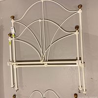 Headboard and footboard white metal with brass finials