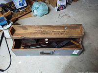 Closed view of toolbox exterior and interior with tools visible