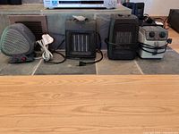 Front view of four of the ceramic space heaters lined up