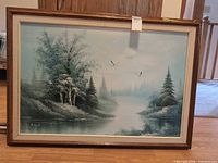 Full view of framed acrylic landscape painting showing composition and frame