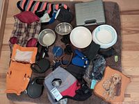 Group shot of all dog supplies laid out on brown mat