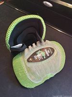 Knee pads side view showing gel cap, mesh backing and interior padding