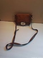 Front view showing full bag with strap attached