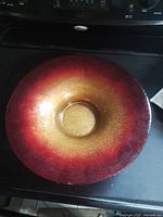 Top view showing full bowl with red-to-gold gradient