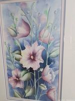 Full view of framed floral watercolor showing composition and matting