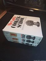 Stack of three McCall's Cooking School binders showing spines 1-3