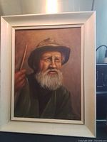 Full frontal view of framed oil portrait