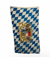 Full view of Bavarian flag showing pattern, coat of arms and grommets