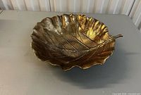 Top view of gold tone gingko leaf bowl