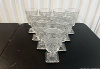 Ten clear Imperial Glass Cape Cod water goblets arranged, showing pattern and quantity