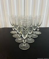 Front view of all 10 Libbey Georgian champagne glasses