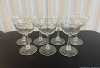 Front view of all seven Libbey 3002 coupe glasses