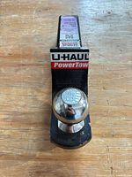Top view showing chrome 2-inch ball and U-Haul PowerTow branding