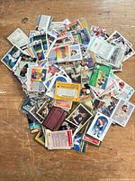 Top-down view of large pile of assorted trading cards