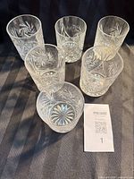 Six crystal short tumblers grouped together