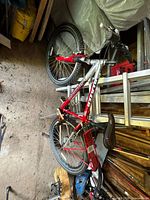Full view of red and silver Blazer mountain bike with rear rack
