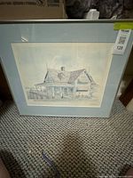 Front view of framed print with mat and frame visible