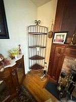 full view of corner shelf beside fireplace