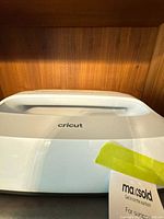 Top view showing Cricut logo and handle
