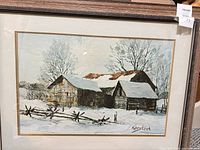 Full view of framed winter barn painting