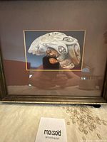Full view of framed print with mat and frame