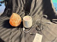 All three items grouped: salt lamp, ceramic warmer, USB light with cords