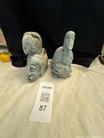 Both soapstone bird figurines side by side