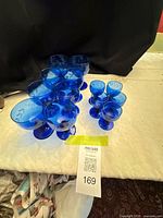 All glasses grouped showing two sizes and etched pattern