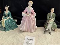 Group shot of all three porcelain figurines