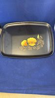 Full view of black Couroc tray showing floral motif