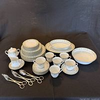Full set arranged on black background showing all pieces